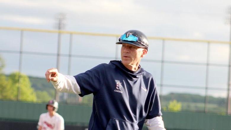 Former Penn State DuBois baseball head coach Tom Calliari gives instructions to his catcher on his way back to the dugout from a mount visit during the 2024 USCAA Small College World Series.